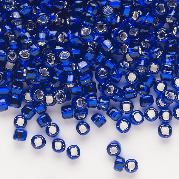 Seed bead, Dyna-Mites™, glass, silver-lined translucent cobalt, #6 round with square hole. Sold per 40-gram pkg. image number 0