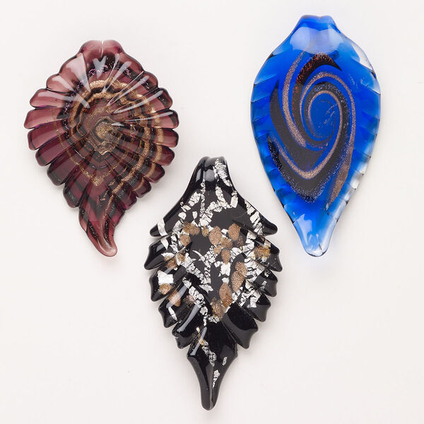 Random focal mix, lampworked glass, opaque and translucent mixed colors with silver-colored foil and copper-colored glitter, 60x39mm-71x46mm textured leaf. Sold per pkg of 3. image number 0