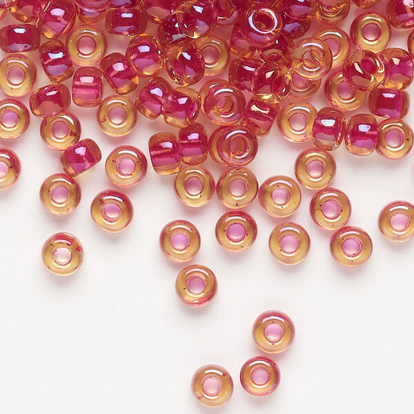 Seed bead, Miyuki, glass, pkg/25g, #6 rocaille, translucent light cranberry-lined luster topaz (RR-363). image number 0