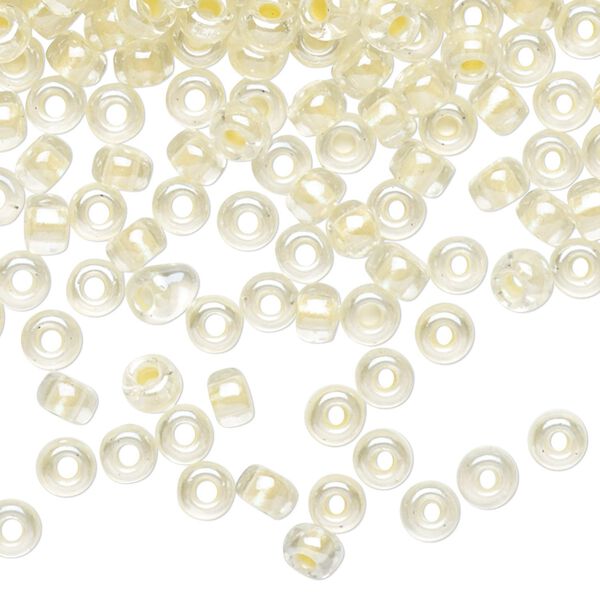 Seed bead, Miyuki, glass, pkg/250g, #6 rocaille, translucent light yellow-lined pearlized crystal clear, (RR-4603). image number 0
