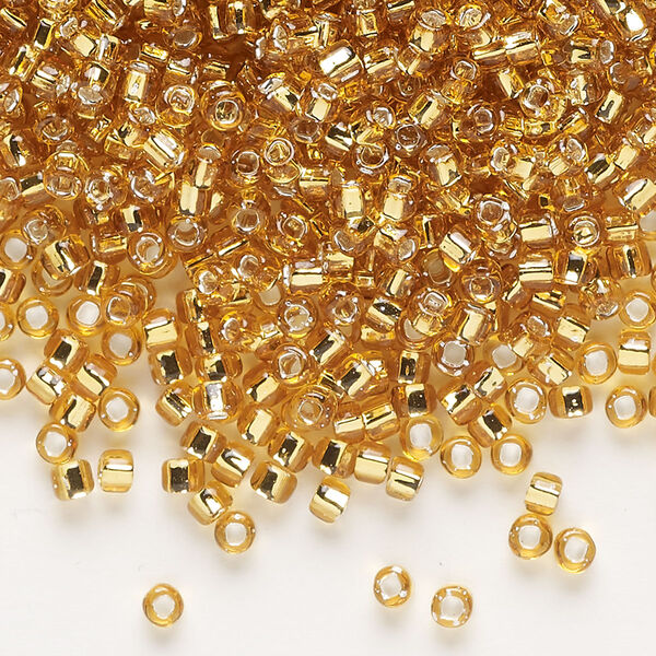Seed bead, Dyna-Mites™, glass, silver-lined translucent gold, #8 round with square hole. Sold per 1/2 kilogram pkg. image number 0