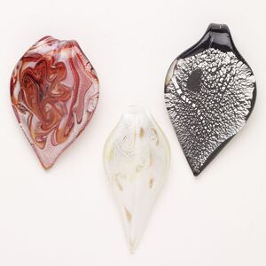 Random focal mix, lampworked glass, opaque mixed colors with silver-colored foil and copper-colored glitter, 2-3/4 x 1-1/2 to 3 x 1-1/2 inch leaf. Sold per pkg of 3.