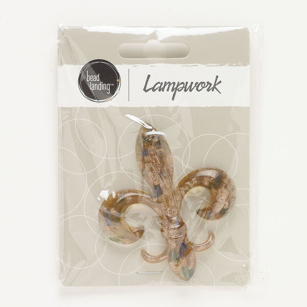 Focal, lampworked glass, opaque and translucent tan/ blue / green, 60x49mm fleur-de-lis with copper-colored glitter. Sold individually. image number 0