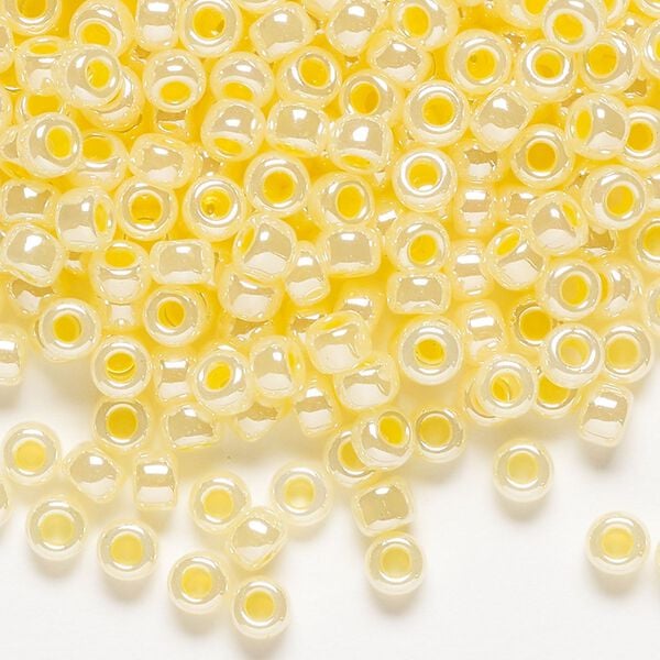 Seed bead, Miyuki, glass, pkg/250g, #6 rocaille, opaque butter cream luster alabaster (RR-527). image number 0