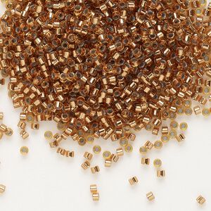 Seed bead, Delica®, glass, pkg/7.5g, #11 round, transparent copper-lined pale amber (DB-0181).