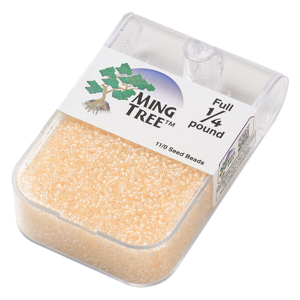 Seed bead, Ming Tree™, glass, pkg/1/4 pound, #11 round, transparent color-lined cream yellow. image number 0