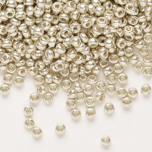 Seed bead, Preciosa Ornela Czech glass, pkg/50g, #8 rocaille, opaque silver finish metallic clear, (18303). image number 0