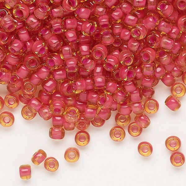 Seed bead, Dyna-Mites™, glass, translucent inside color fuchsia, #6 round. Sold per 1/2 kilogram pkg. image number 0