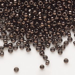 Seed bead, Dyna-Mites™, glass, opaque iris dark bronze, #8 round. Sold per 1/2 kilogram pkg.