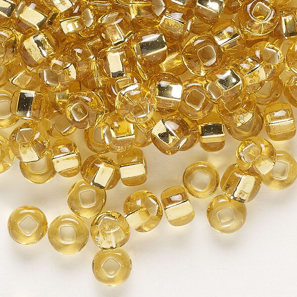 Seed bead, Preciosa Ornela, glass, transparent silver-lined light topaz, #2 rocaille with square hole. Sold per 50-gram pkg. image number 0