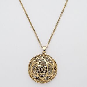 Necklace, glass rhinestone with gold-finished steel and "pewter" (zinc-based alloy), clear, 40mm round with rose cutout design, 29 inches with 3-inch extender chain and lobster claw clasp. Sold individually.