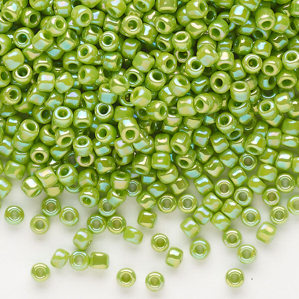 Seed bead, Dyna-Mites™, glass, opaque rainbow lime, #8 round. Sold per 1/2 kilogram pkg. image number 0