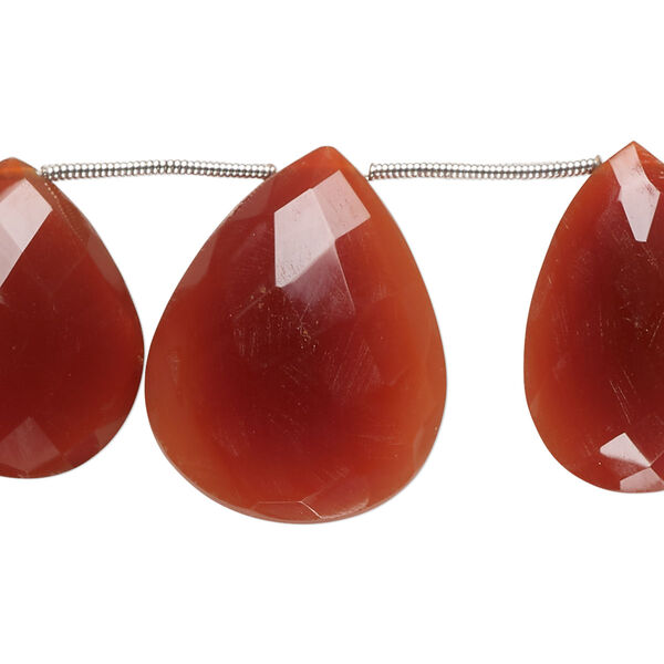 Bead, carnelian (dyed/heated), 17x11mm-26x20mm graduated top-drilled hand-cut faceted puffed teardrop, B grade, Mohs hardness 6-1/2 to 7. Sold per pkg of 10. image number 0
