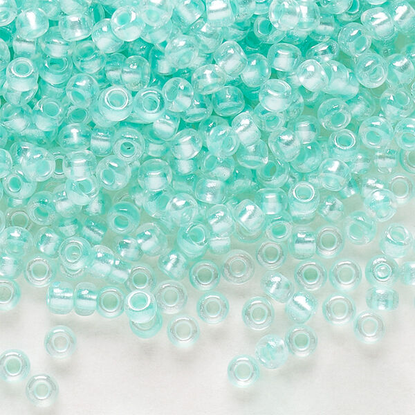 Seed bead, Preciosa Ornela Czech glass, pkg/500g, #8 rocaille, translucent color-lined luster pastel green, (382PG). image number 0