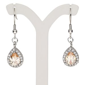 Earring, glass rhinestone and stainless steel, clear and peach, 35mm with teardrop and fishhook ear wire. Sold per pair.