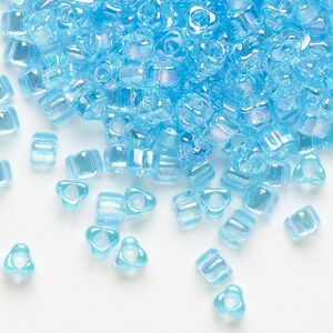 Seed bead, Miyuki, glass, transparent iris light blue, (TR1155), #5 triangle. Sold per 25-gram pkg.