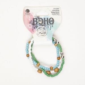 Bracelet, stretch, silver-finished steel / wood / acrylic, multicolored, 4-6mm wide with 19mm Om drop; 7 inches. Sold per pkg of 4.