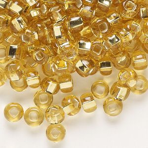 Seed bead, Preciosa Ornela, glass, transparent silver-lined light topaz, #2 rocaille with square hole. Sold per 500-gram pkg.