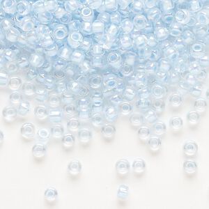 Seed bead, Dyna-Mites™, glass, translucent inside color rainbow ice blue, #8 round. Sold per 1/2 kilogram pkg.