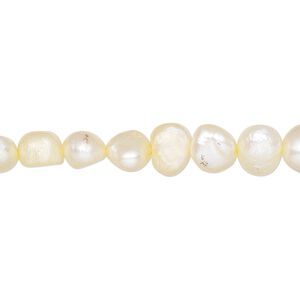 Pearl, cultured freshwater (dyed), daffodil, 6-7mm flat-sided potato, D grade, Mohs hardness 2-1/2 to 4. Sold per 16-inch strand.