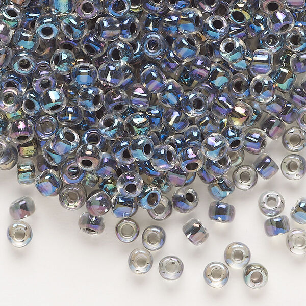 Seed bead, Dyna-Mites™, glass, transparent rainbow inside peacock, #6 round. Sold per 40-gram pkg. image number 0