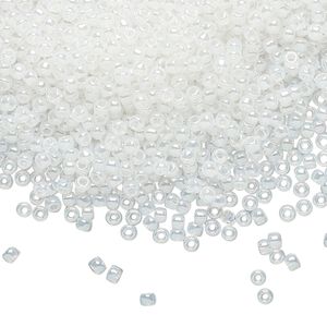 Seed bead, TOHO BEADS®, glass, pkg/250g, #11 round, translucent ceylon snowflake (TR-11-141).