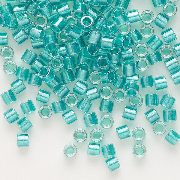 Seed bead, Delica®, glass, pkg/7.5g, #8 round, translucent teal green-lined luster crystal clear (DBL-0904). image number 0