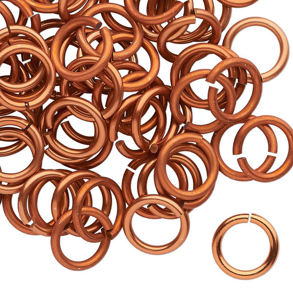 Jump ring, anodized tempered aluminum, orange copper, 10mm round, 7.2mm inside diameter, 15 gauge. Sold per pkg of 100. image number 0