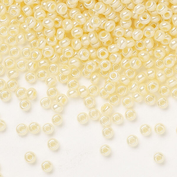 Seed bead, Preciosa Ornela Czech glass, pkg/50g, #8 rocaille, opaque luster light cream pearl, (47113). image number 0