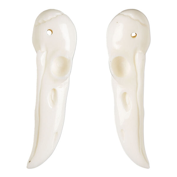 Focal, bone (bleached), 39x11mm hand-cut single-sided carved raven skull, Mohs hardness 2-1/2. Sold individually. image number 0