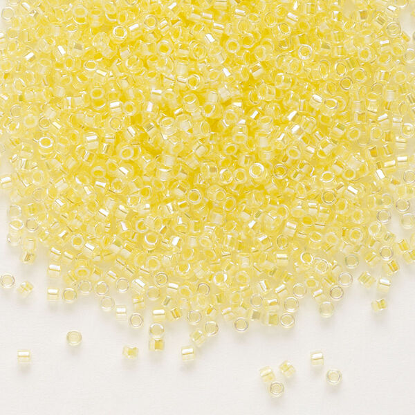 Seed bead, Delica®, glass, pkg/250g, #11 round, translucent light yellow-lined rainbow crystal clear (DB-0053). image number 0