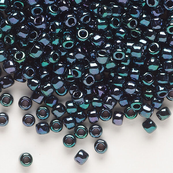 Seed bead, Dyna-Mites™, glass, opaque iris green, #6 round. Sold per 40-gram pkg. image number 0