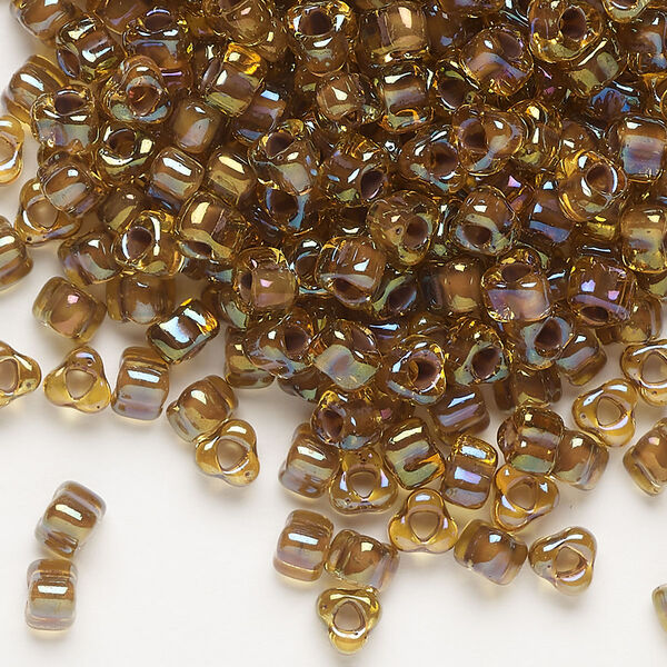 Seed bead, Miyuki, glass, transparent dark amber yellow color-lined purple, (TR1162), #5 triangle. Sold per 25-gram pkg. image number 0