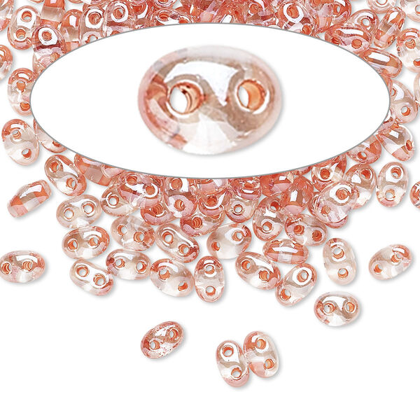 Seed bead, Preciosa Twin™ Czech glass, pkg/50g, 5x2.5mm oval, transparent peach terra color-lined clear, (38689). image number 0