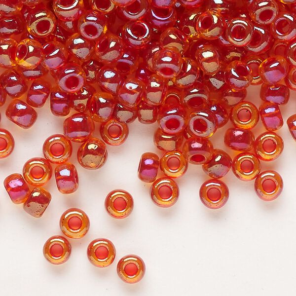 Seed bead, Miyuki, glass, pkg/25g, #6 rocaille, translucent scarlet-lined luster crystal clear (RR-3528). image number 0