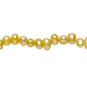 Pearl, cultured freshwater (dyed), gold, 7x5mm-8x6mm top-drilled rice, D grade, Mohs hardness 2-1/2 to 4. Sold per 15-inch strand.