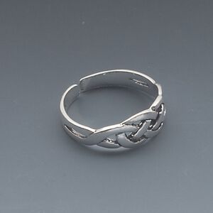 Toe ring, antiqued sterling silver, 5mm wide with Celtic knot design, adjustable. Sold individually.