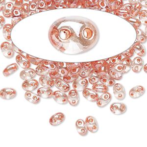 Seed bead, Preciosa Twin™ Czech glass, pkg/50g, 5x2.5mm oval, transparent peach terra color-lined clear, (38689).