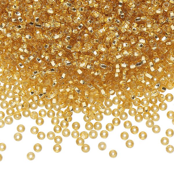 Seed bead, Preciosa Ornela Czech glass, pkg/500g, #11 rocaille, transparent silver-lined light topaz, (17020). image number 0
