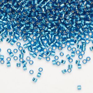 Seed bead, Delica®, glass, pkg/7.5g, #10 round, transparent silver-lined Capri blue (DBM-0149).