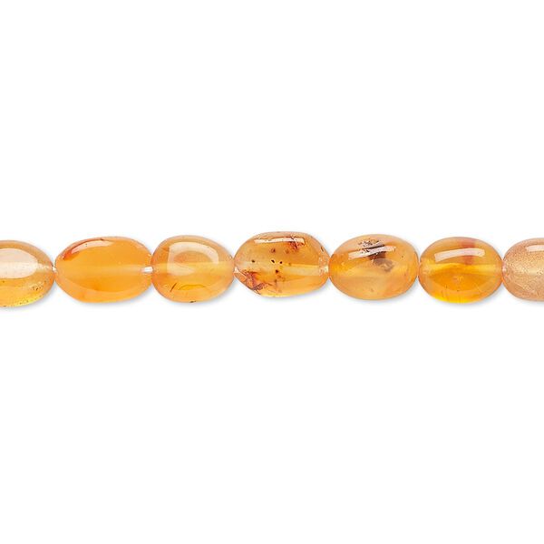 Bead, carnelian (dyed / heated), light to medium, 6x5mm-11x7mm hand-cut puffed oval, C- grade, Mohs hardness 6-1/2 to 7. Sold per 13-inch strand. image number 0