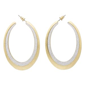 Earring, stainless steel with gold-finished brass and steel, silver with glitter, 2 inches with scratched open oval hoop and post. Sold per pair.