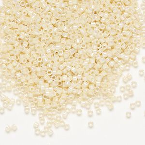 Seed bead, Delica®, glass, pkg/50g, #11 round, opaque rainbow cream (DB-0157).