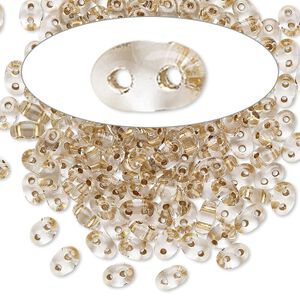 Seed bead, Preciosa Twin™ Czech glass, pkg/10g, 5x2.5mm oval, transparent bronze color-lined clear, (68106).