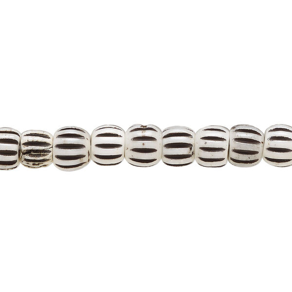 Bead, bone (dyed), white and black, 6.5x5.5mm corrugated barrel. Sold per 15-1/2" to 16" strand. image number 0