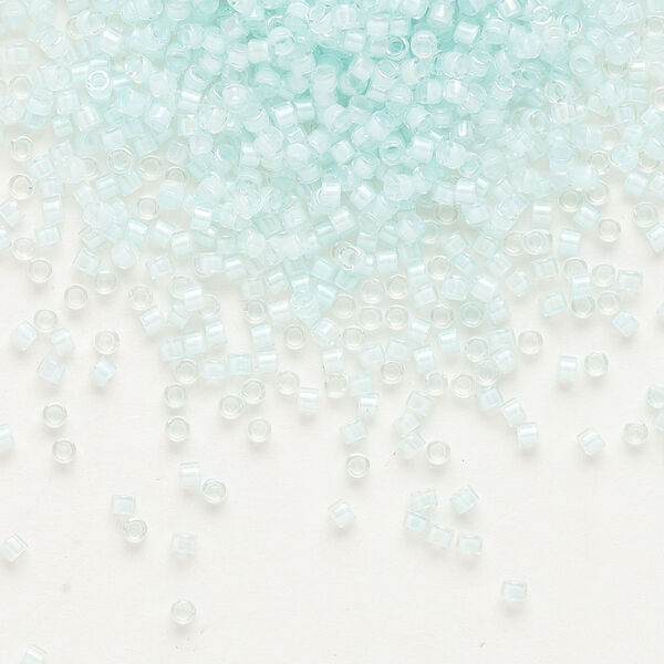 Seed bead, Delica®, glass, pkg/7.5g, #11 round, translucent aqua mist-lined luster crystal clear (DB-0078). image number 0