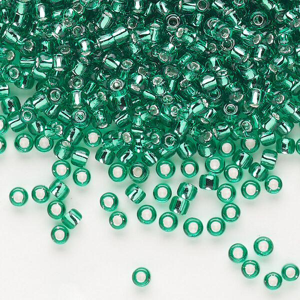 Seed bead, Dyna-Mites™, glass, silver-lined translucent jade green, #8 round. Sold per 1/2 kilogram pkg. image number 0