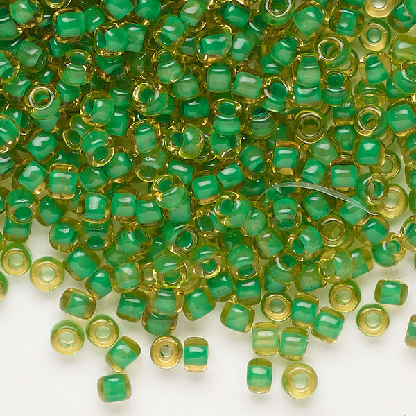 Seed bead, Dyna-Mites™, glass, translucent inside color lime, #6 round. Sold per 40-gram pkg. image number 0