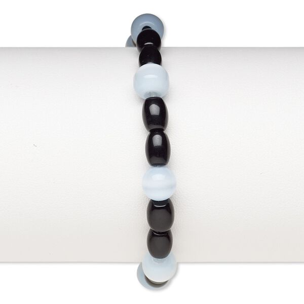 Bracelet, stretch, glass and cat's eye glass, opaque blue-violet and black, 7-8mm round and 7x5mm-8x6mm barrel, 6-1/2 inches. Sold individually. image number 0